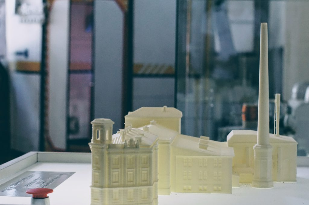 A city block printed to scale in white resin